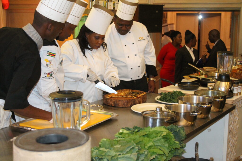 First-Lady Auxicillia Mnangagwa showing her cooking skills at the luanch of the Zimbabwe Food and Culture Festival